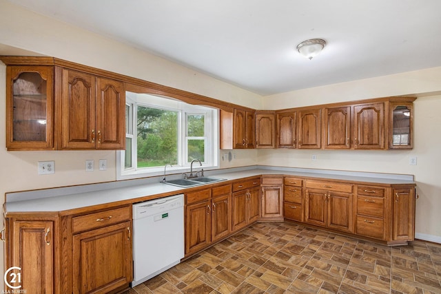 6424 Hunters Creek Rd, Imlay City, MI 48444 - kitchen featuring white dishwasher, a sink, and brown cabinets
