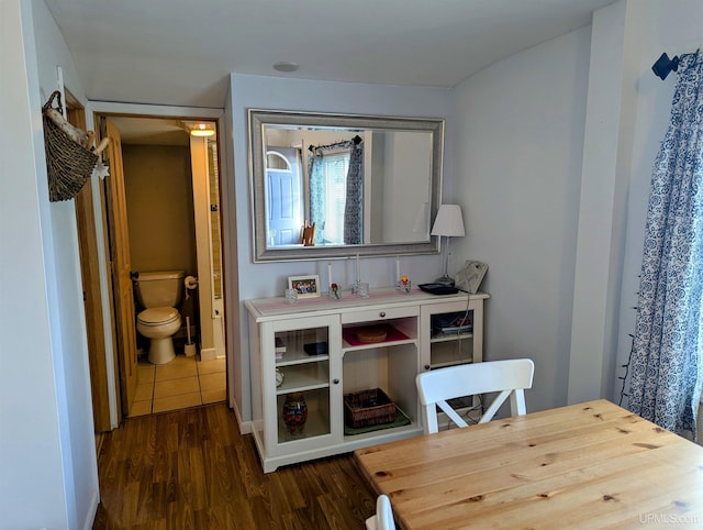 dining room with dark wood-style floors