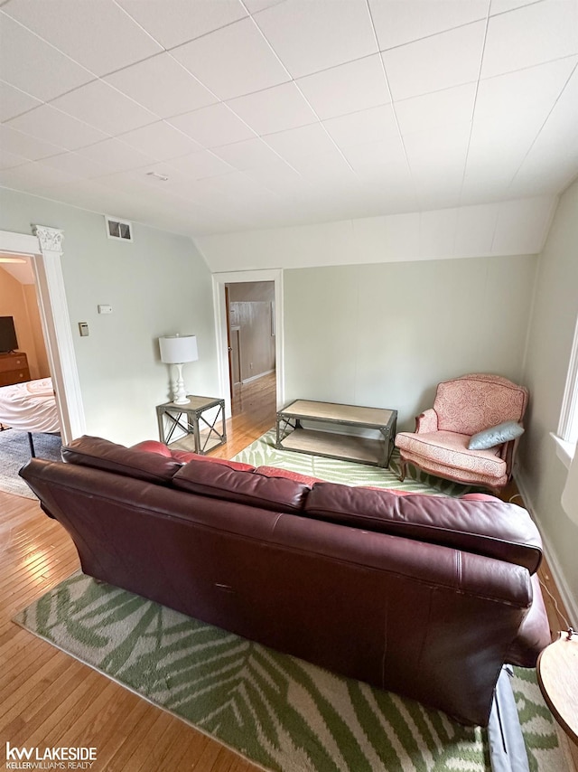 living area with hardwood / wood-style floors
