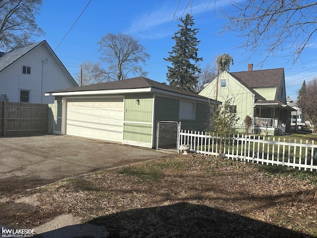 detached garage with fence