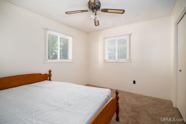 25358 Branch Rd, Michigamme, MI 49861 - bedroom with carpet flooring, a closet, and ceiling fan