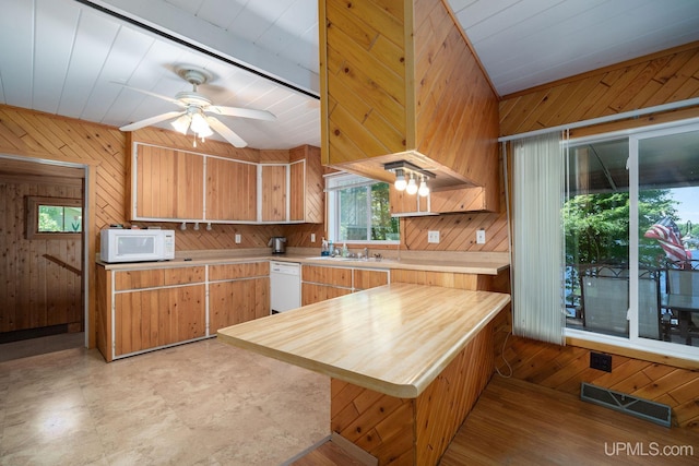 25358 Branch Rd, Michigamme, MI 49861 - kitchen featuring white appliances, wooden walls, a ceiling fan, a sink, and butcher block counters
