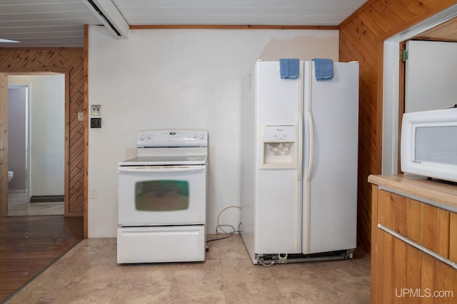 25358 Branch Rd, Michigamme, MI 49861 - kitchen featuring white appliances and wooden walls