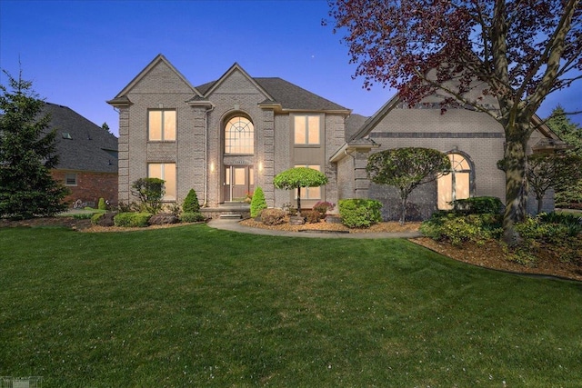 53633 Cherrywood Dr, Shelby Twp, MI 48315 - view of front of house with a lawn and brick siding
