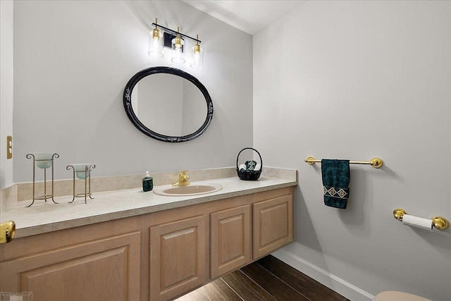 53633 Cherrywood Dr, Shelby Twp, MI 48315 - bathroom with vanity, baseboards, and wood finished floors