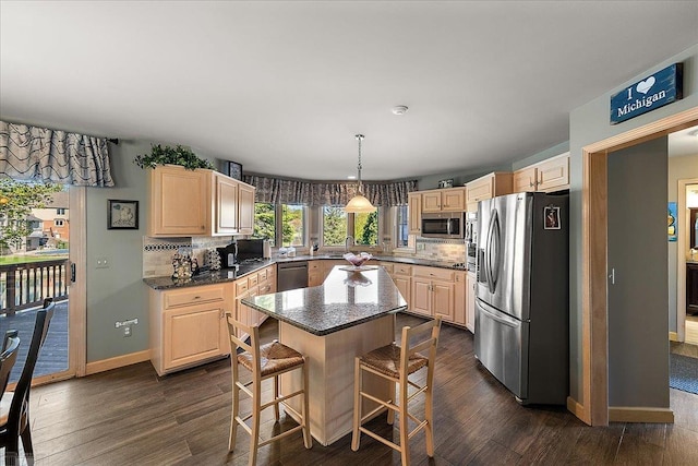 53633 Cherrywood Dr, Shelby Twp, MI 48315 - kitchen featuring stainless steel appliances, light brown cabinetry, decorative backsplash, and dark wood-style floors