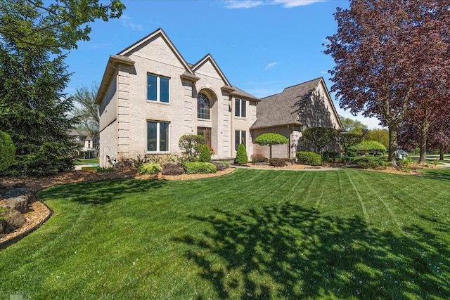 53633 Cherrywood Dr, Shelby Twp, MI 48315 - view of front of house featuring a front lawn and brick siding