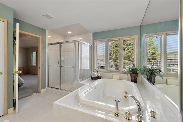 53633 Cherrywood Dr, Shelby Twp, MI 48315 - bathroom featuring tile patterned flooring, a stall shower, a tub with jets, and baseboards