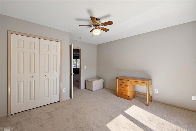 53633 Cherrywood Dr, Shelby Twp, MI 48315 - unfurnished bedroom with carpet flooring, a closet, ceiling fan, and baseboards