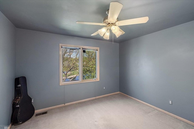 53633 Cherrywood Dr, Shelby Twp, MI 48315 - unfurnished room featuring carpet flooring, baseboards, and a ceiling fan