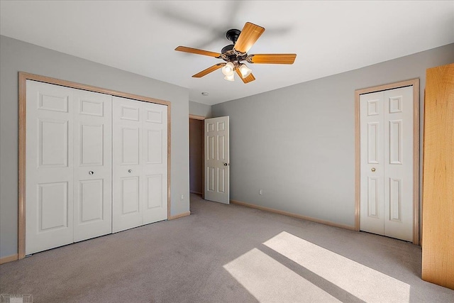 53633 Cherrywood Dr, Shelby Twp, MI 48315 - unfurnished bedroom with carpet flooring, baseboards, ceiling fan, and a closet