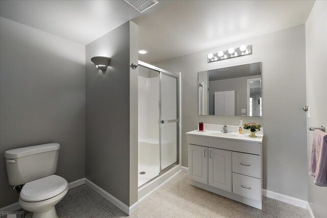 53633 Cherrywood Dr, Shelby Twp, MI 48315 - bathroom featuring a stall shower, vanity, and baseboards