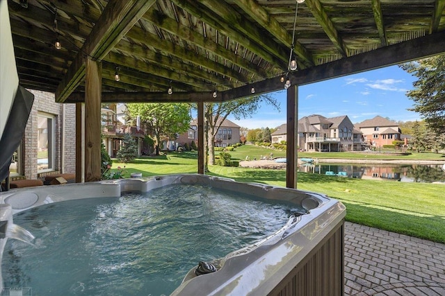 53633 Cherrywood Dr, Shelby Twp, MI 48315 - view of patio / terrace featuring a hot tub, a residential view, and a water view