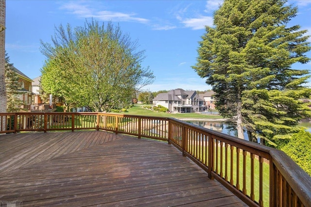 53633 Cherrywood Dr, Shelby Twp, MI 48315 - wooden deck featuring a residential view, a water view, and a lawn