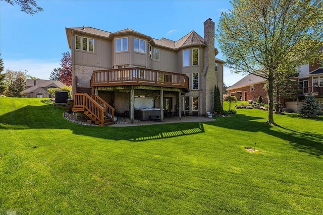 53633 Cherrywood Dr, Shelby Twp, MI 48315 - back of property featuring a hot tub, a wooden deck, stairs, a chimney, and a yard
