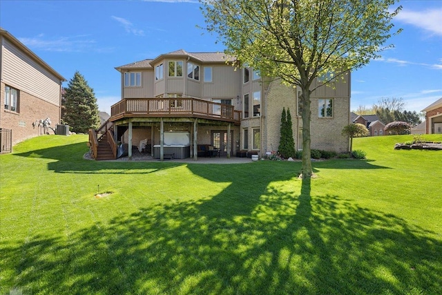 53633 Cherrywood Dr, Shelby Twp, MI 48315 - rear view of property with a hot tub, a deck, central air condition unit, a patio, and a yard