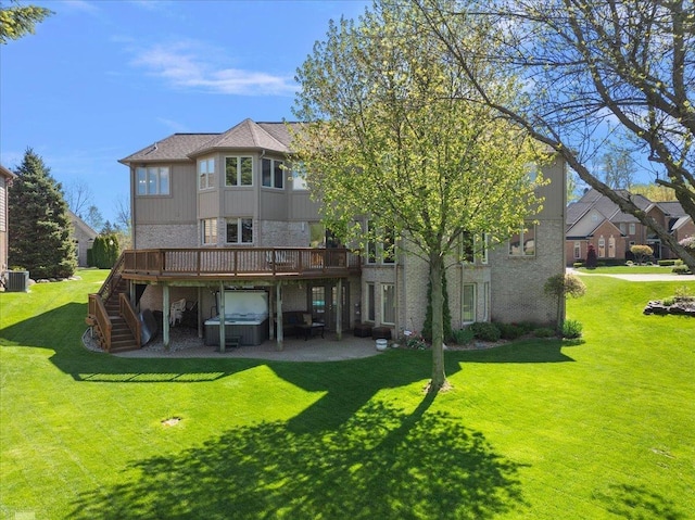 53633 Cherrywood Dr, Shelby Twp, MI 48315 - rear view of house with a covered hot tub, a deck, stairs, and a yard
