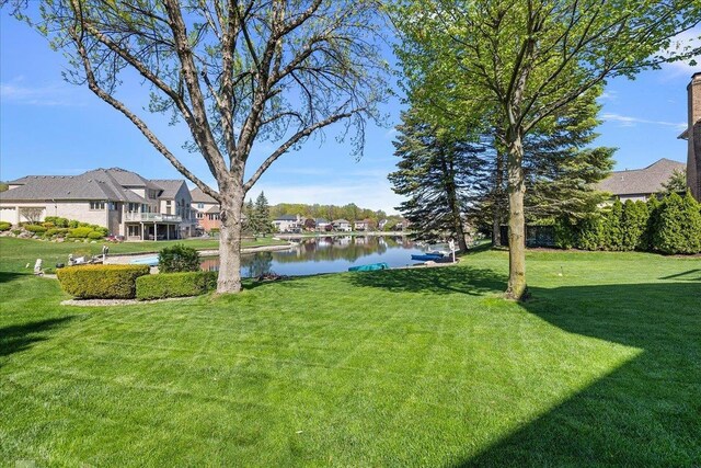 53633 Cherrywood Dr, Shelby Twp, MI 48315 - view of green lawn with a water view