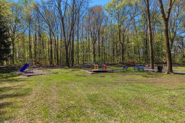 53633 Cherrywood Dr, Shelby Twp, MI 48315 - view of green lawn with a playground