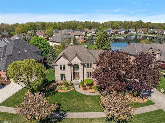 53633 Cherrywood Dr, Shelby Twp, MI 48315 - french country style house with a residential view, a front yard, and a water view