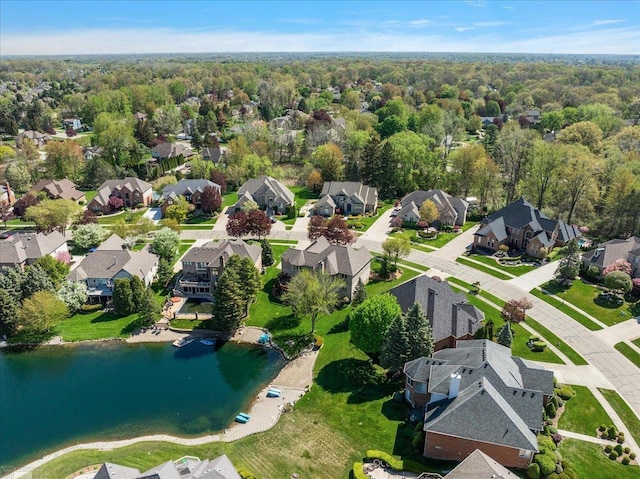 53633 Cherrywood Dr, Shelby Twp, MI 48315 - aerial view of residential area featuring a large body of water and a heavily wooded area