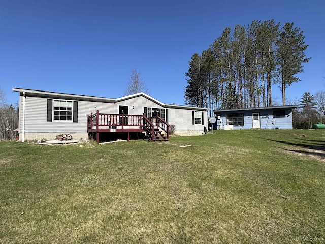 5278 27.5 Rd, Gladstone, MI 49837 - back of house with a wooden deck, a yard, and crawl space