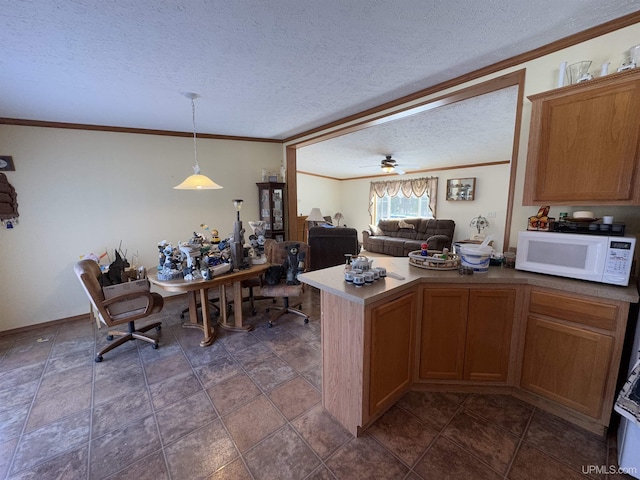 5278 27.5 Rd, Gladstone, MI 49837 - kitchen featuring white microwave, a textured ceiling, ornamental molding, a peninsula, and open floor plan