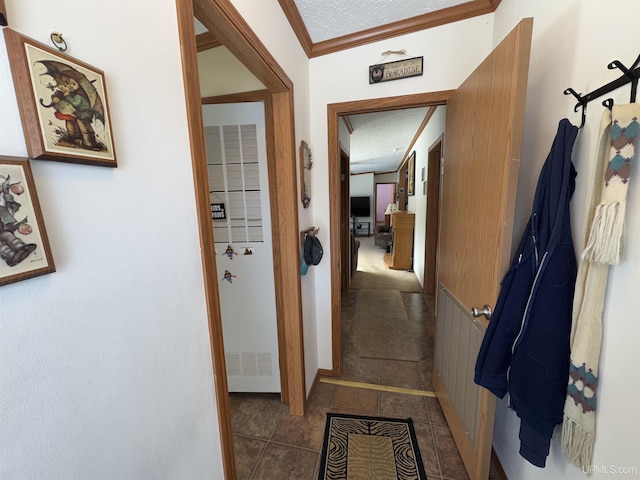 5278 27.5 Rd, Gladstone, MI 49837 - hallway with ornamental molding and tile patterned floors