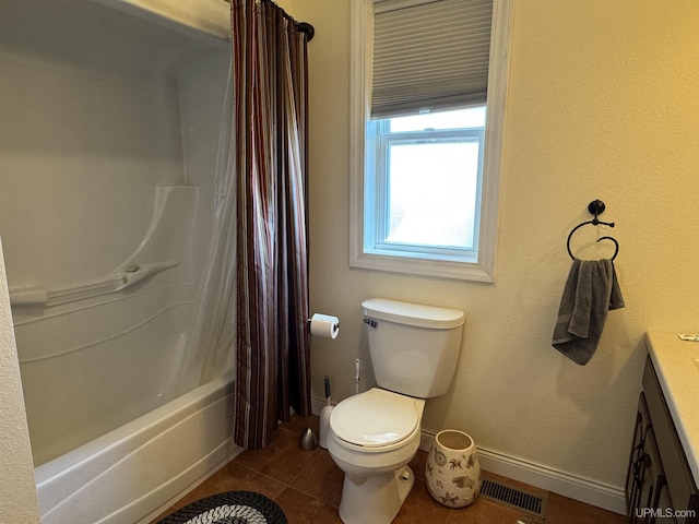 6403 N 1st St, Wells, MI 49894 - bathroom featuring tile patterned floors, toilet, vanity, shower / tub combo, and baseboards