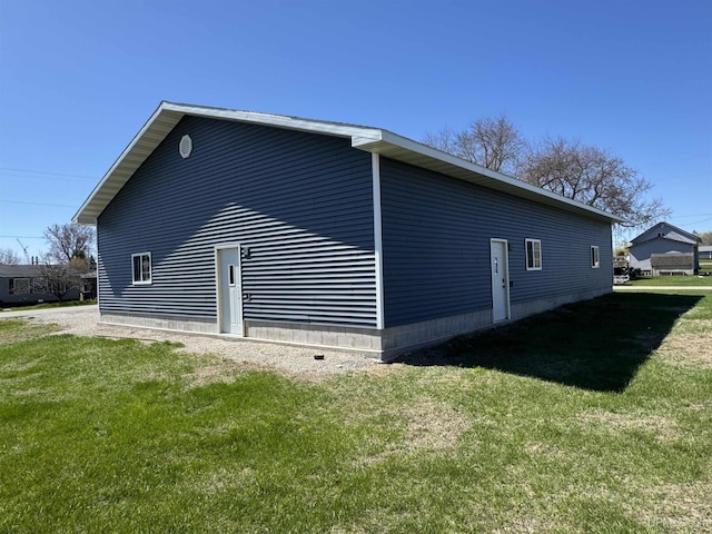 6403 N 1st St, Wells, MI 49894 - view of home's exterior with a lawn and a garage