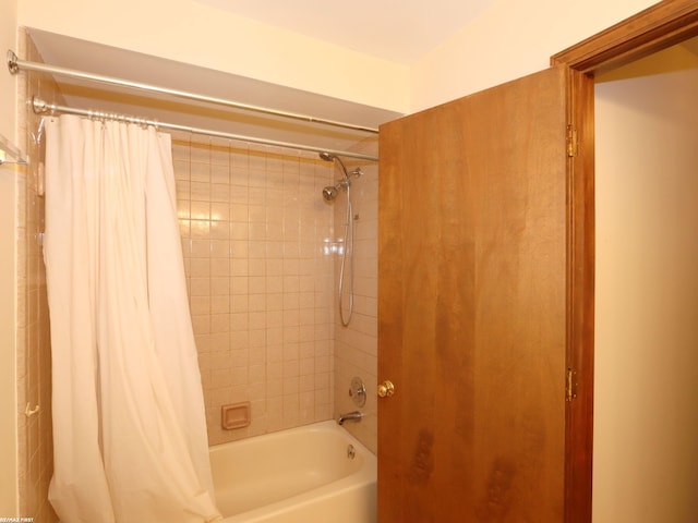full bath featuring shower / bath combo with shower curtain