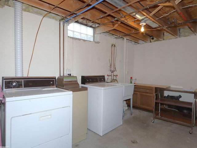 washroom featuring washer and dryer