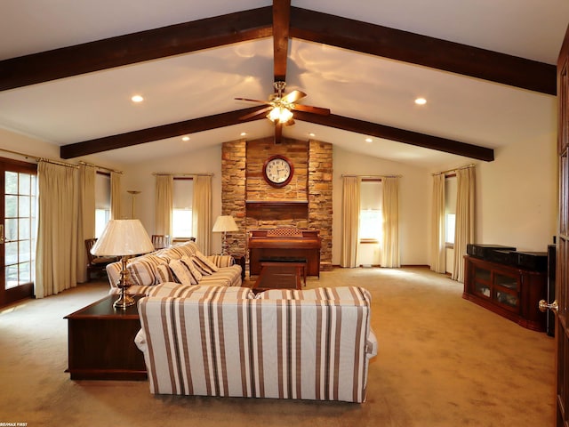 living area featuring carpet flooring, recessed lighting, ceiling fan, and a stone fireplace