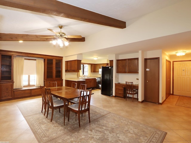 dining space with light tile patterned floors and a ceiling fan