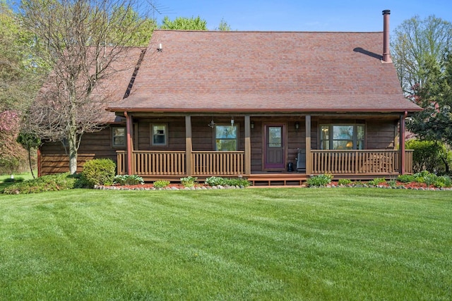 view of front facade with a porch and a front lawn