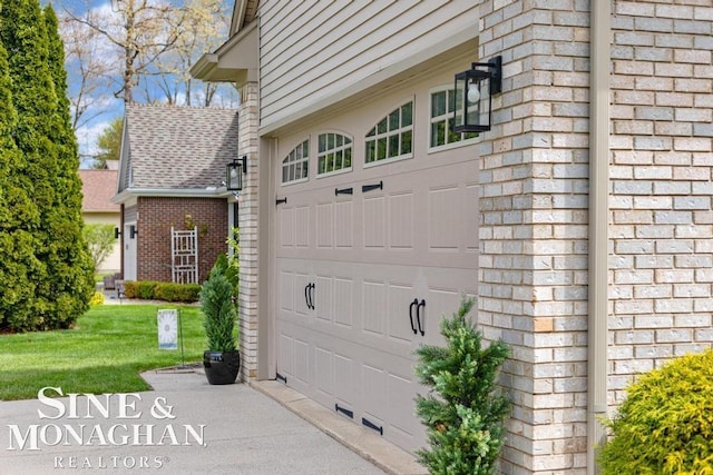 garage with concrete driveway