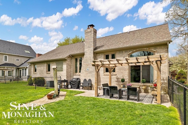 back of house featuring a pergola, brick siding, a patio, and a shingled roof