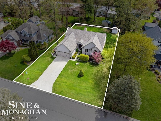 aerial view of residential area featuring property parcel outlined