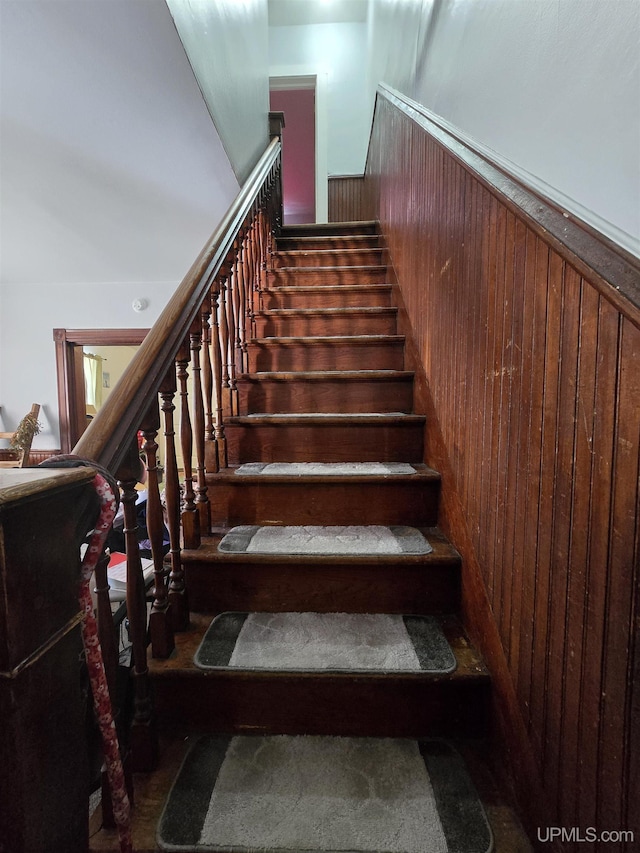 118 S Tamarack St, Laurium, MI 49913 - staircase featuring wood walls