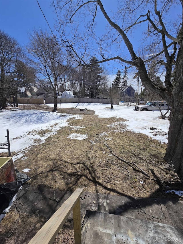 118 S Tamarack St, Laurium, MI 49913 - yard covered in snow featuring fence
