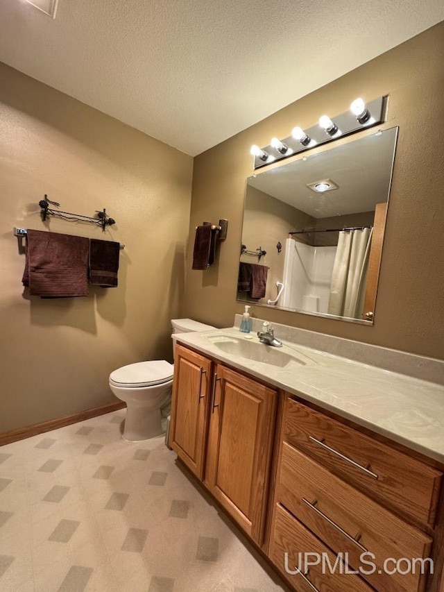698 E River Dr, Lanse, MI 49946 - bathroom featuring tile patterned floors, toilet, vanity, curtained shower, and a textured ceiling