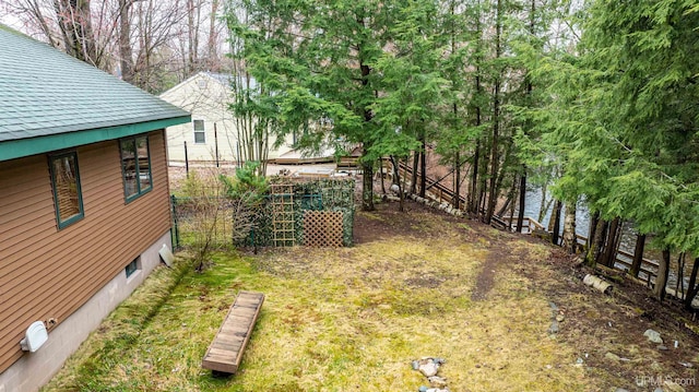 698 E River Dr, Lanse, MI 49946 - view of yard featuring fence