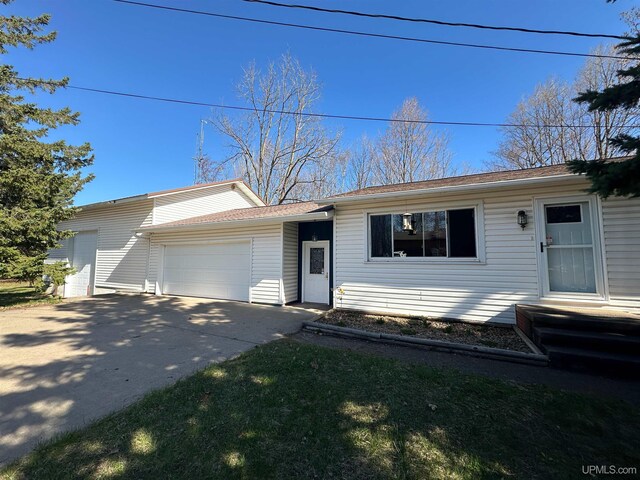2246 Allen St, Marquette, MI 49855 - single story home with an attached garage and concrete driveway