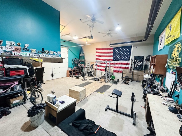 2246 Allen St, Marquette, MI 49855 - miscellaneous room with a garage, ceiling fan, and concrete floors