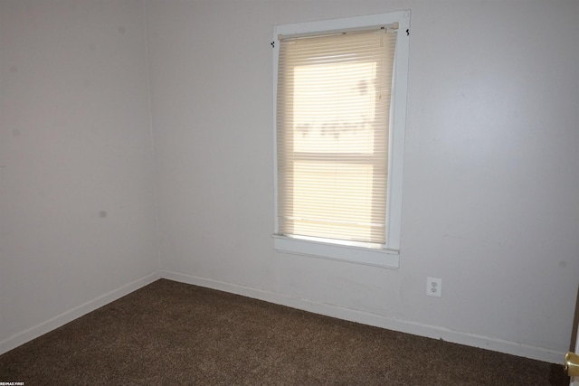 26333 Belanger St, Roseville, MI 48066 - spare room with dark carpet and baseboards