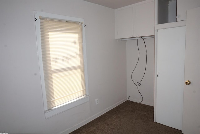 26333 Belanger St, Roseville, MI 48066 - empty room with dark colored carpet, plenty of natural light, and baseboards
