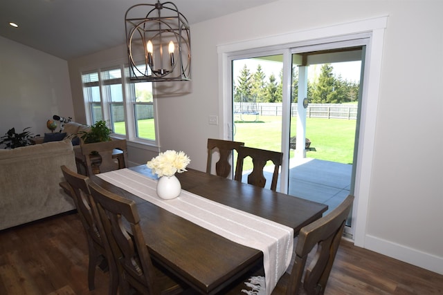 7272 S 7 Mile Rd, Freeland, MI 48623 - dining space with a chandelier, dark wood finished floors, baseboards, lofted ceiling, and recessed lighting