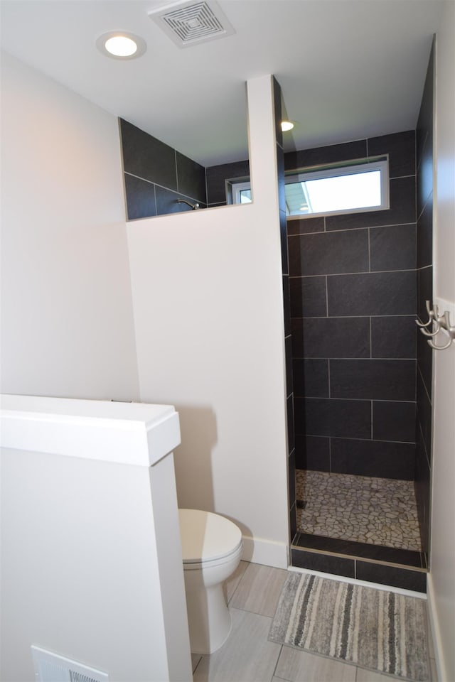 7272 S 7 Mile Rd, Freeland, MI 48623 - bathroom with a walk in shower and toilet