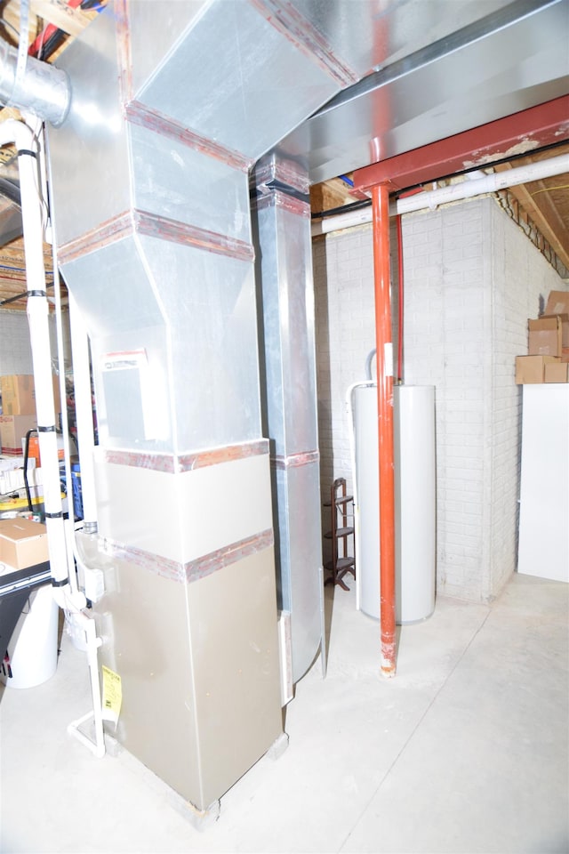 7272 S 7 Mile Rd, Freeland, MI 48623 - unfinished below grade area featuring water heater
