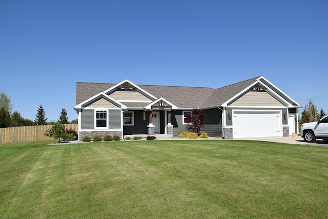 7272 S 7 Mile Rd, Freeland, MI 48623 - craftsman house with stone siding, an attached garage, and driveway